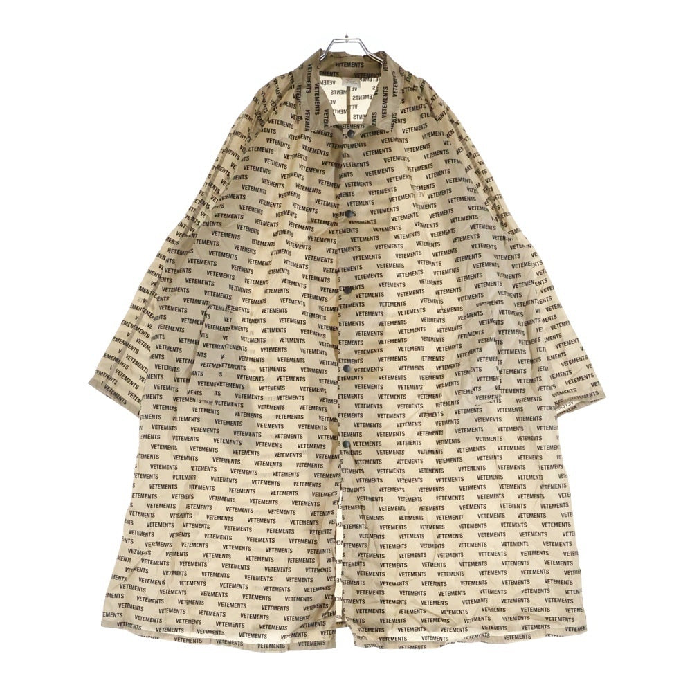 VETEMENTS(ヴェトモン) 18AW MONOGRAM RAINCOAT ロゴ総柄 ナイロン ロングコート レインコート ベージュ UAH19JA301