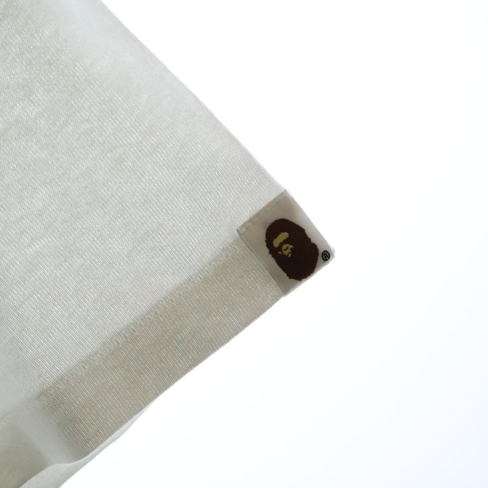 A BATHING APE(アベイシングエイプ) ABC CAMO COLLEGE TEE フロントプリント クルーネック半袖Tシャツカットソー レディース ホワイト/ピンク 001TEL8020005L