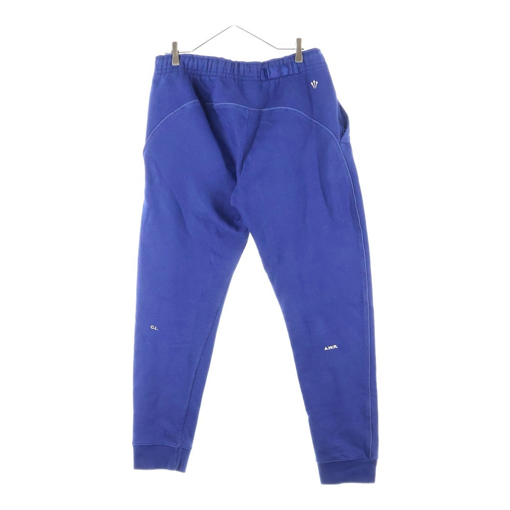 NIKE(ナイキ) xDrake NOCTA NRG FLEECE PANT ×ドレイク スウッシュロゴ刺繍入り フリーススウェットトレーナーパンツ ネイビー DA3935-492