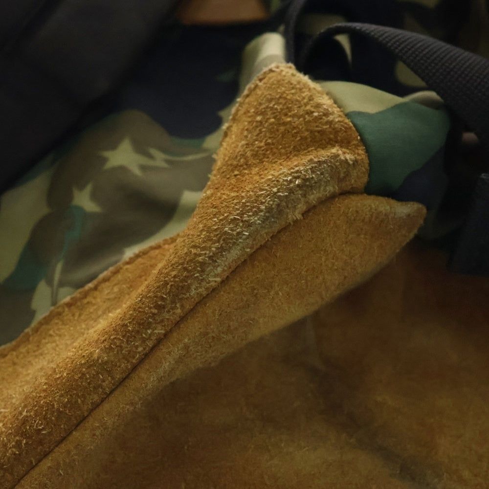 A BATHING APE(アベイシングエイプ) ×KAWS bendy 1st camo green APE HEAD backpack ×カウズ ベンディー ファーストカモエイプヘッド総柄バックパックリュック グリーン
