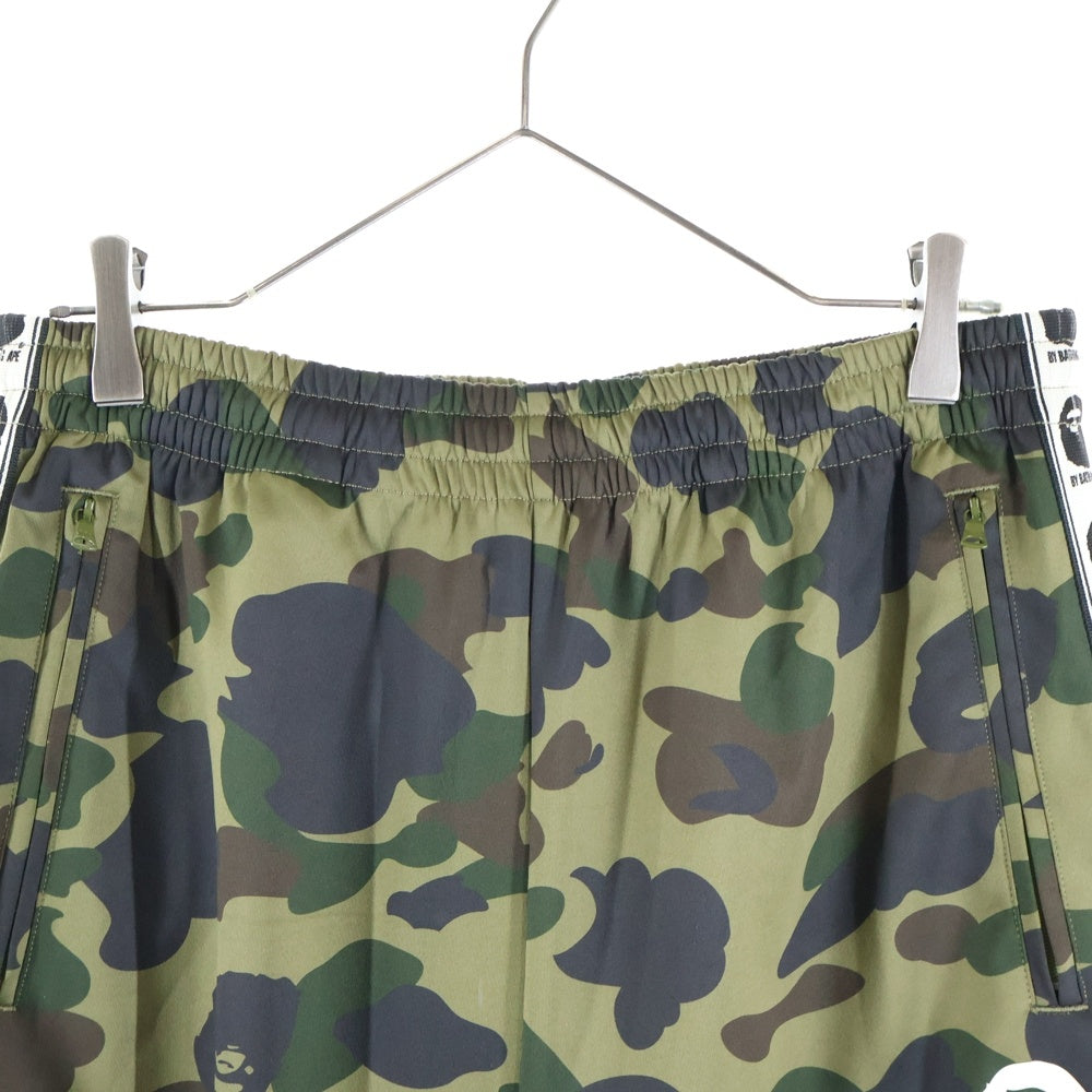 A BATHING APE(アベイシングエイプ) 1ST CAMO LOOSE FIT TRACK PANTS カモ総柄 エイプヘッドプリント ロゴサイドライン トラックパンツ グリーン 1L80-115-008