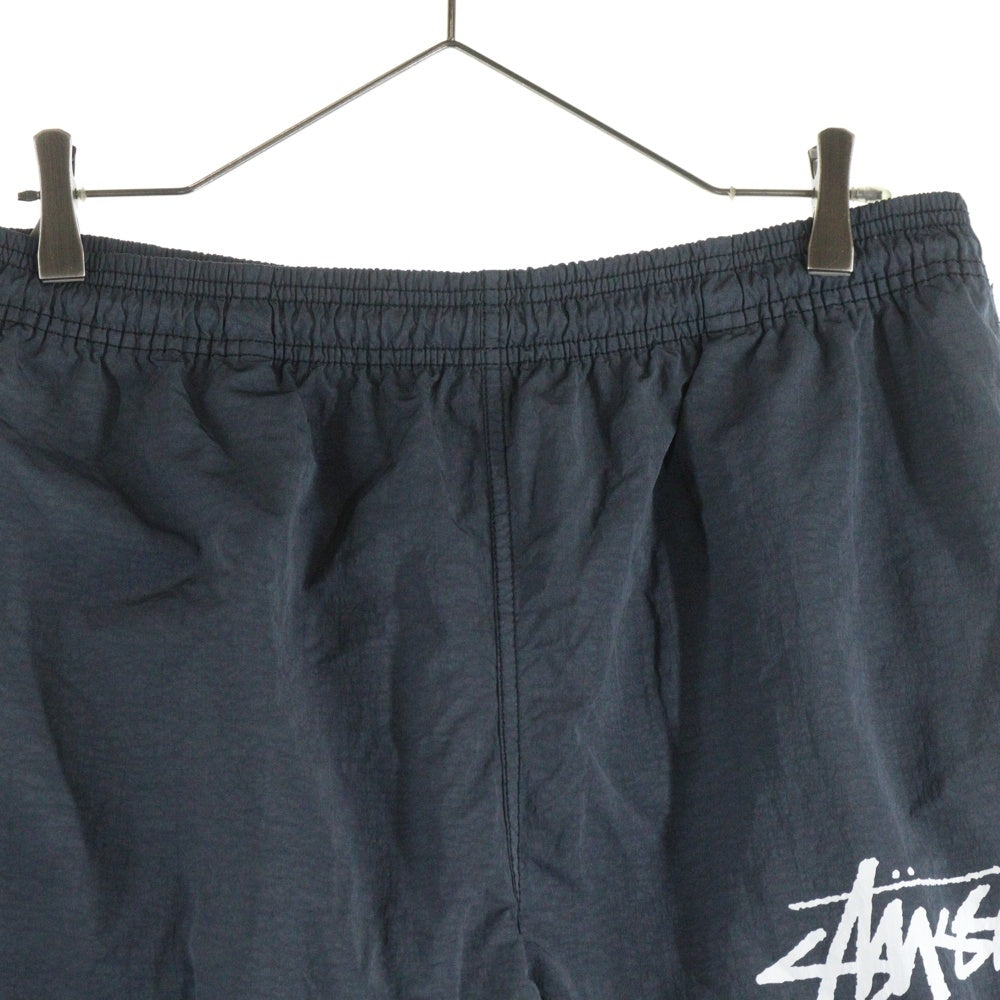 STUSSY(ステューシー) ×NIKE Beach Pant Off Noir ロゴプリント ナイロンパンツ ブラック CT4316-045