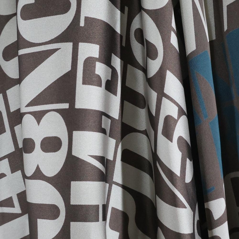 Sacai(サカイ) 20AW ×Alexander Girard アレキサンダー ジラード 英字総柄 プリント ロングスカート ブラウン レディース 20-05295