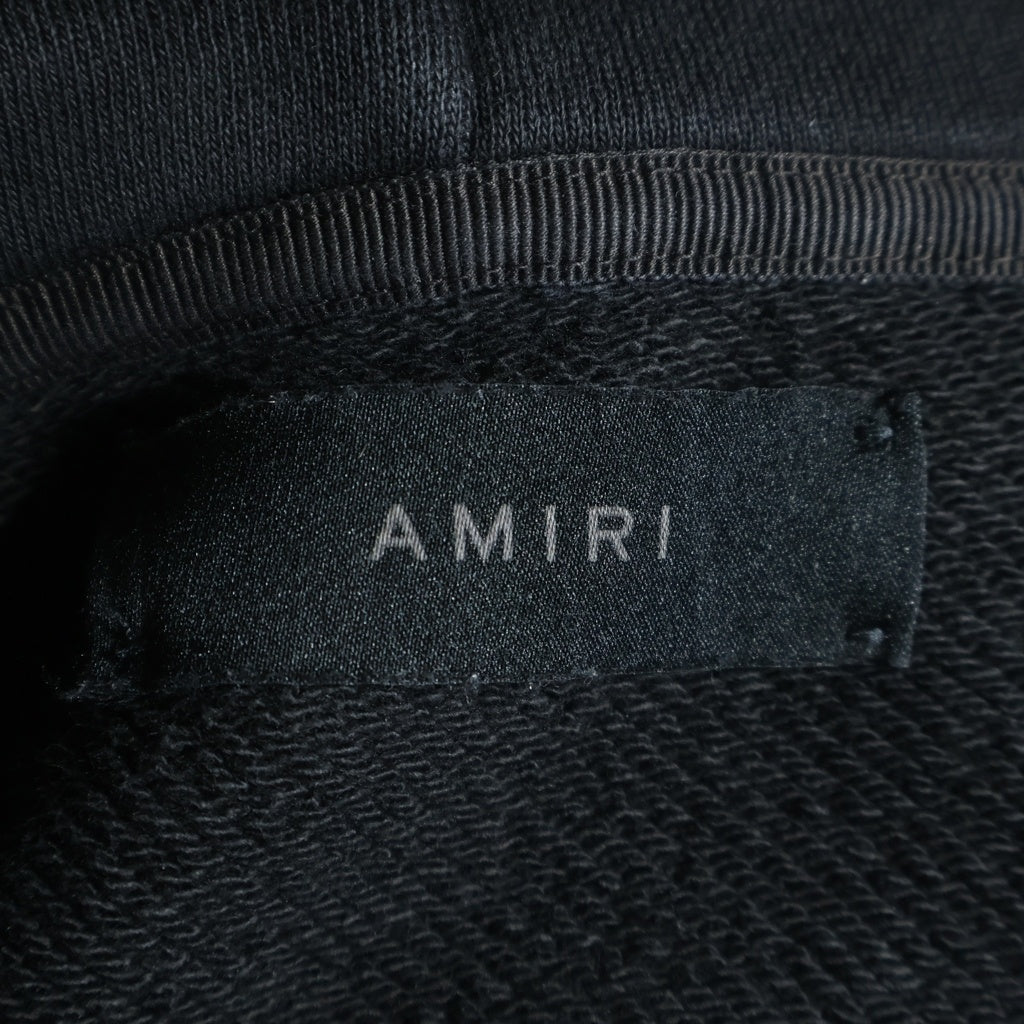 AMIRI(アミリ) Theatre Masks Hoodie バックプリント プルオーバーパーカー ブラック SRAJYHD1069