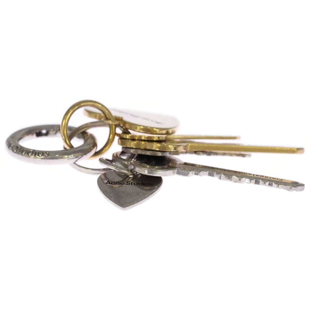 Acne Studios(アクネ ストゥディオズ) ハートキーモチーフ ロゴ入り キーリング シルバー/ゴールド レディース