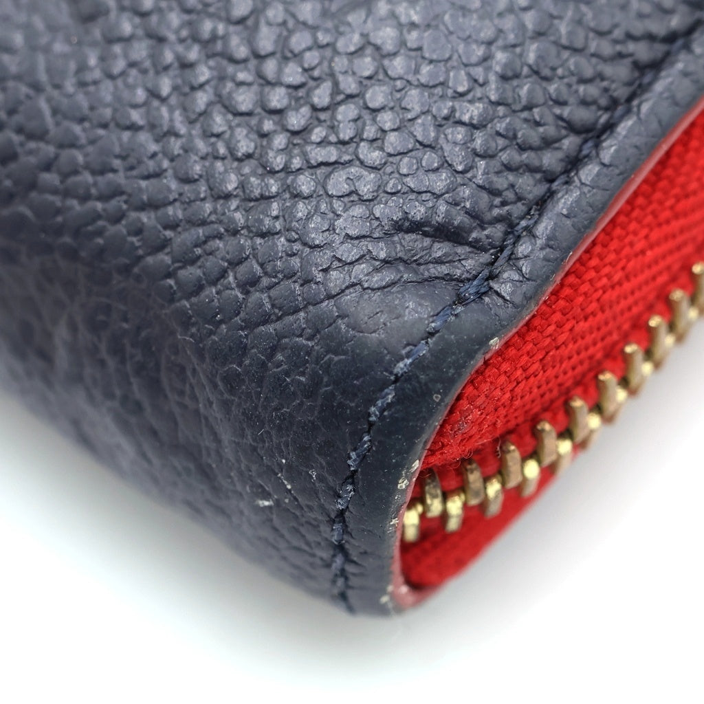 LOUIS VUITTON(ルイヴィトン) モノグラム・アンプラント ポルトフォイユクレマンス ラウンドジップレザーウォレット ネイビー/レッド M68325 レディース
