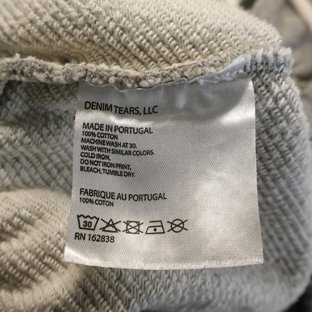 DENIM TEARS(デニムティアーズ) The Cotton Wreath Sweat Pants コットンリース 長袖スウェットパンツ グレー ‐