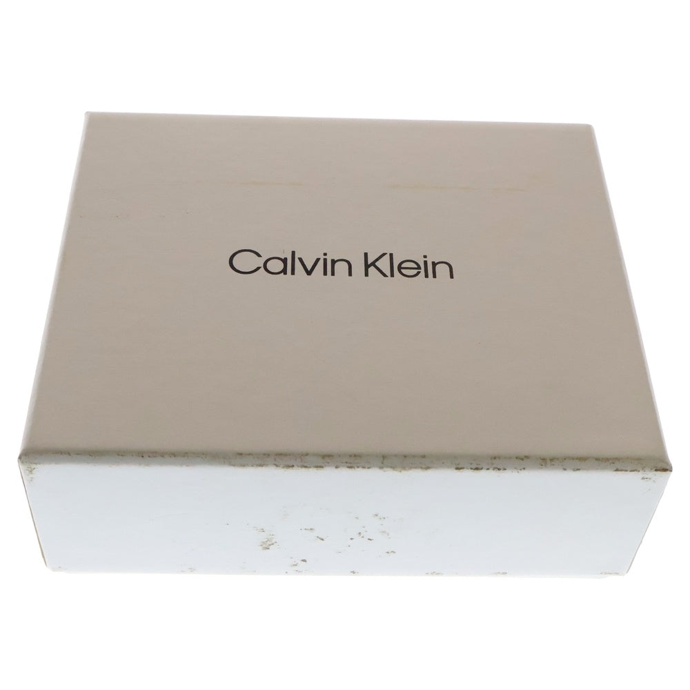 Calvin Klein(カルバンクライン) ロゴプレート レザー コンパクトウォレット 三つ折り財布 シルバー金具 イエロー