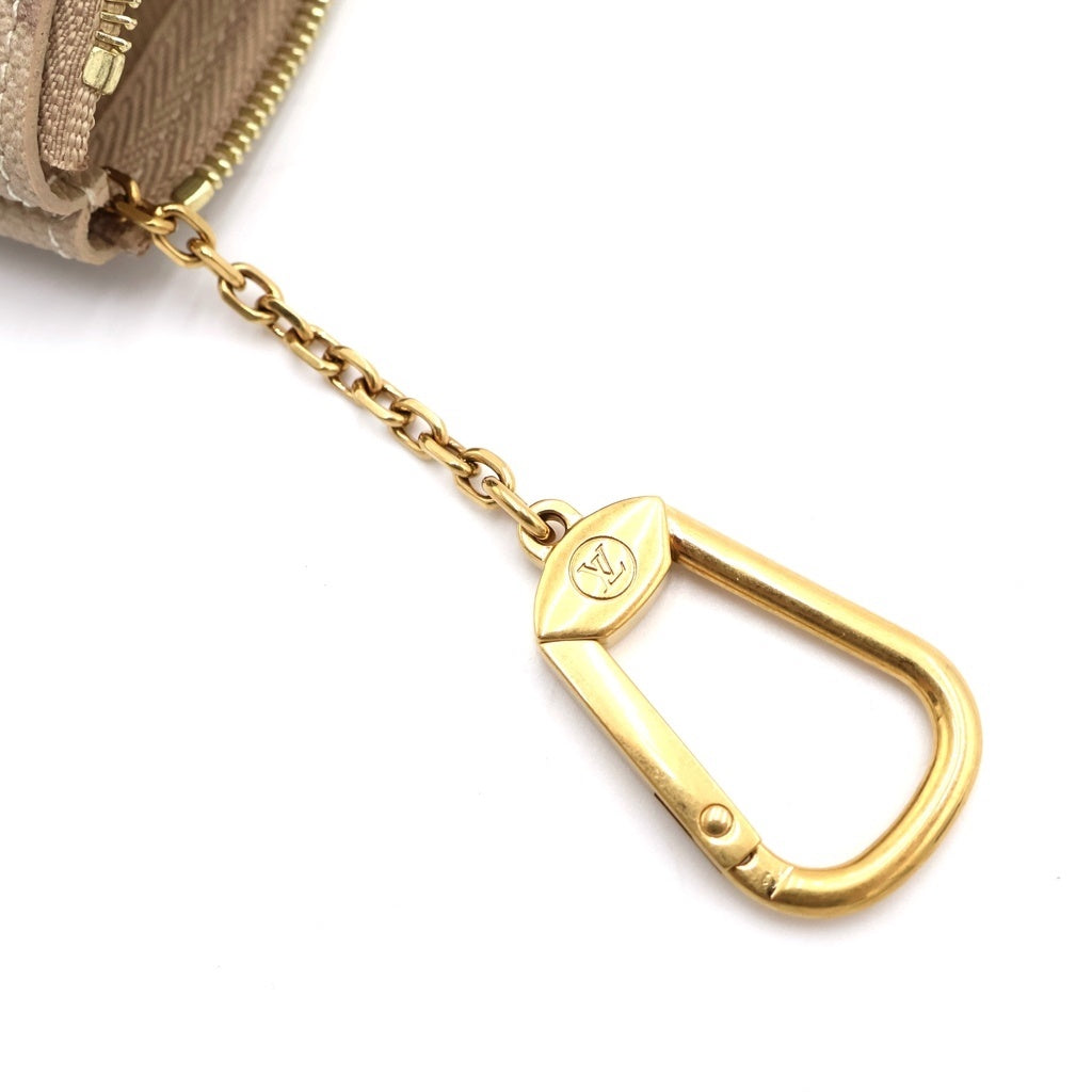 LOUIS VUITTON(ルイヴィトン) モノグラム サープラス ポシェット・クレ バッグチャーム 小物入れ ケース ポーチ ベージュ PVC M29258 ゴールド金具 レディース