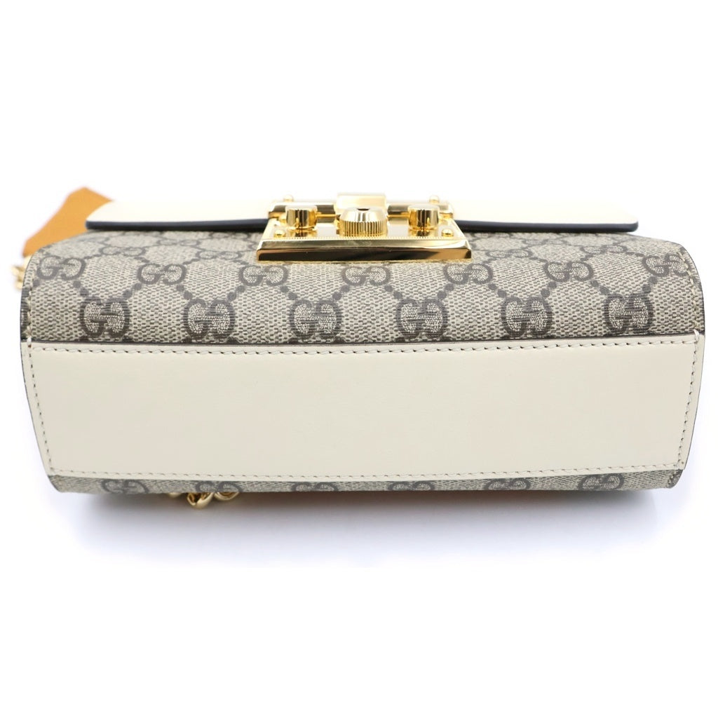 GUCCI(グッチ) GG パドロック ショルダーバッグ ベージュ×アイボリー×オレンジ PVC×レザー 409487 レディース