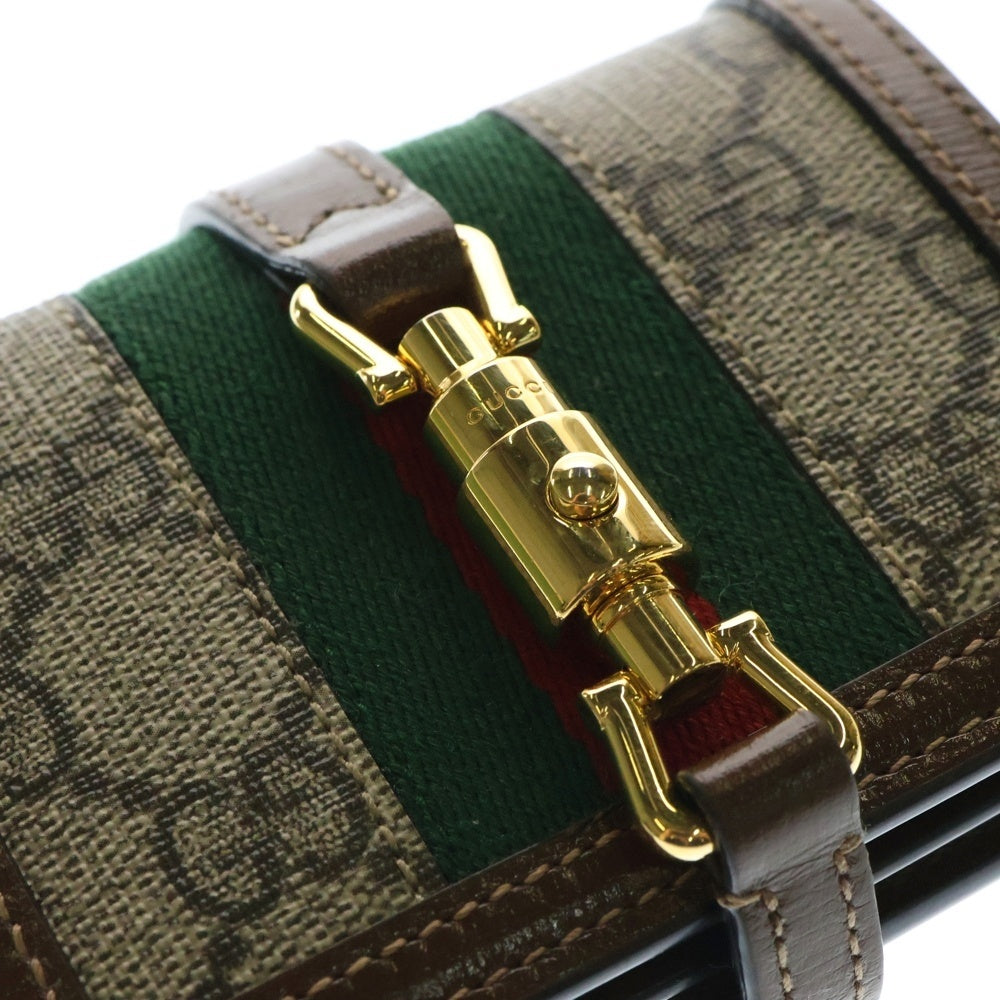 GUCCI(グッチ) ジャッキー1961 GGスプリーム ウェブ シェリーライン レザー キャンバス コンパクトウォレット 二つ折り財布 ゴールド金具 ブラウン 645536