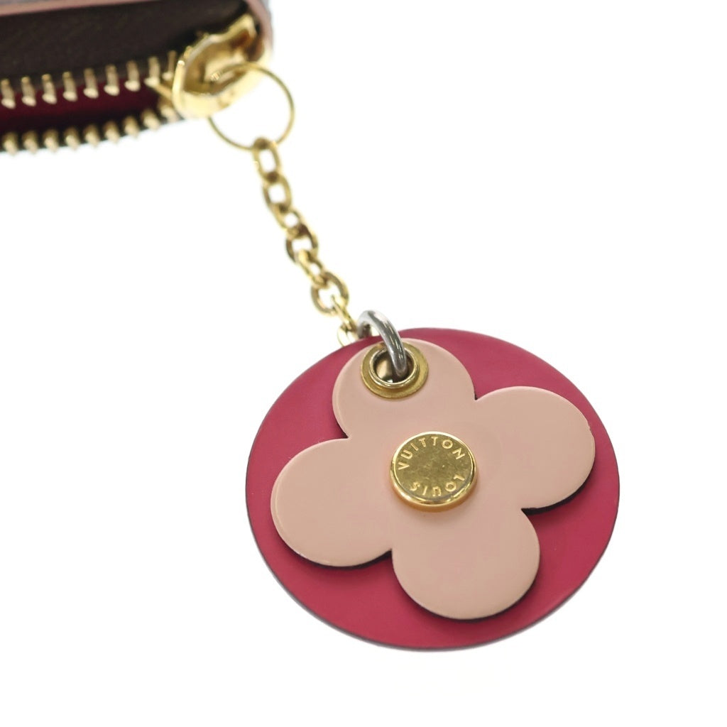 LOUIS VUITTON(ルイヴィトン) ポルトフォイユクレマンス フラワーチャーム モノグラム PVC レザー ジッピーウォレット 長財布 ブラウン M68314 レディース
