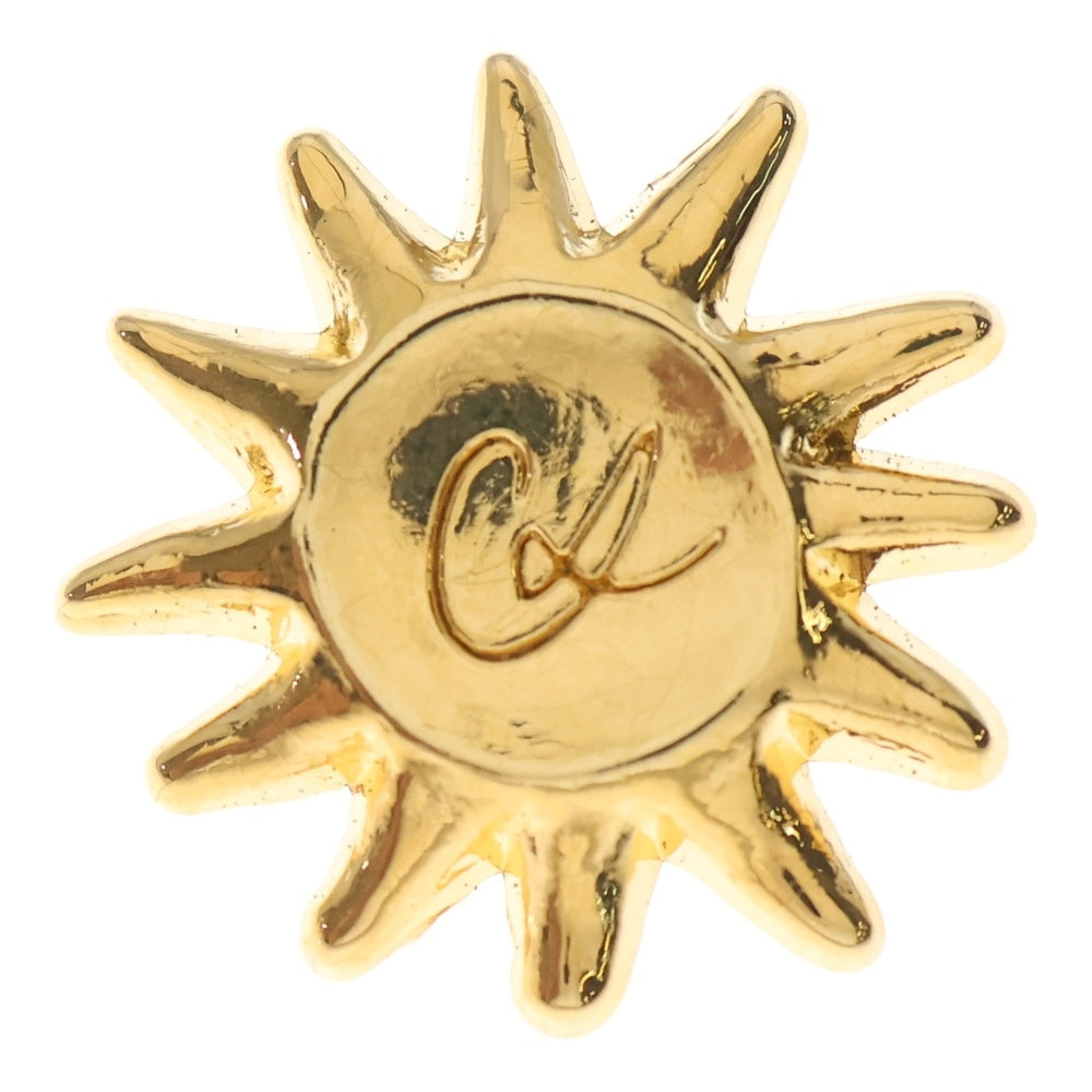 Christian Lacroix(クリスチャンラクロワ) ロゴ 太陽モチーフ ピンバッジ ゴールド レディース