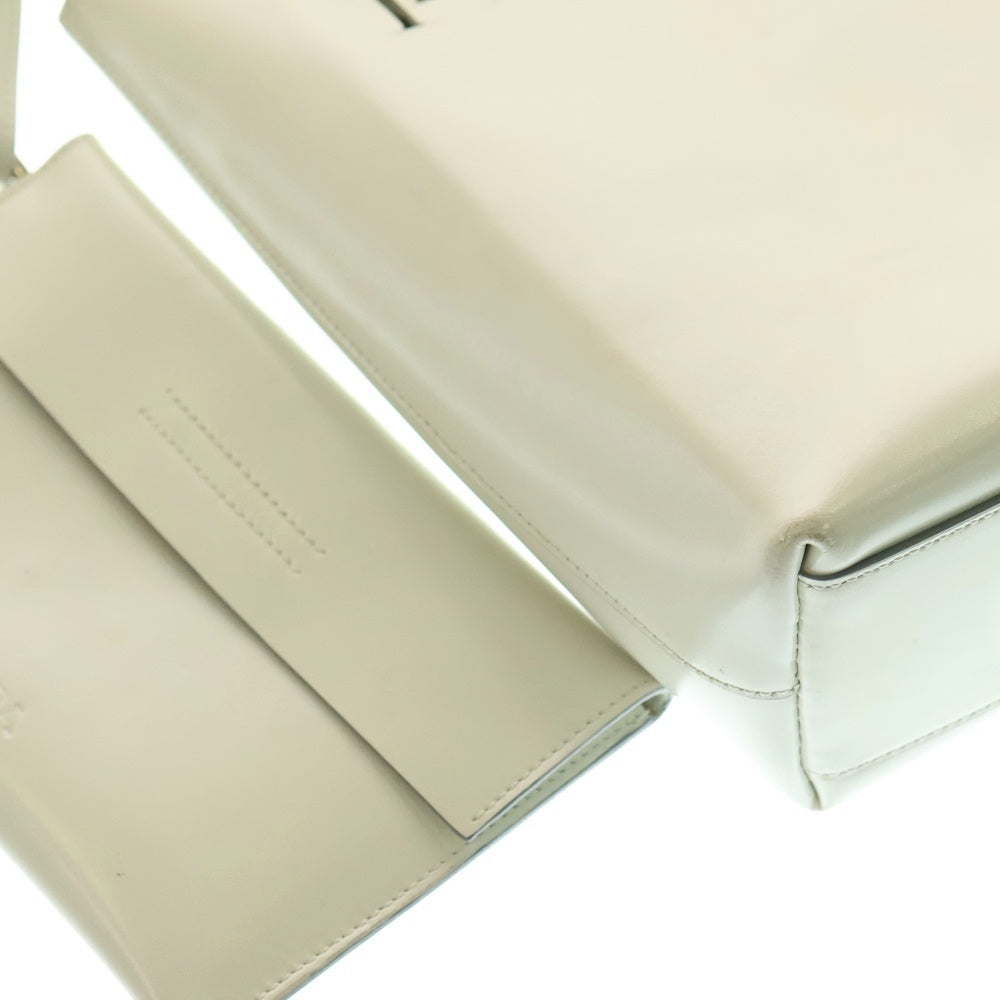 PRADA(プラダ) パンチング ロゴ ハンドバッグ トートバッグ アイボリー