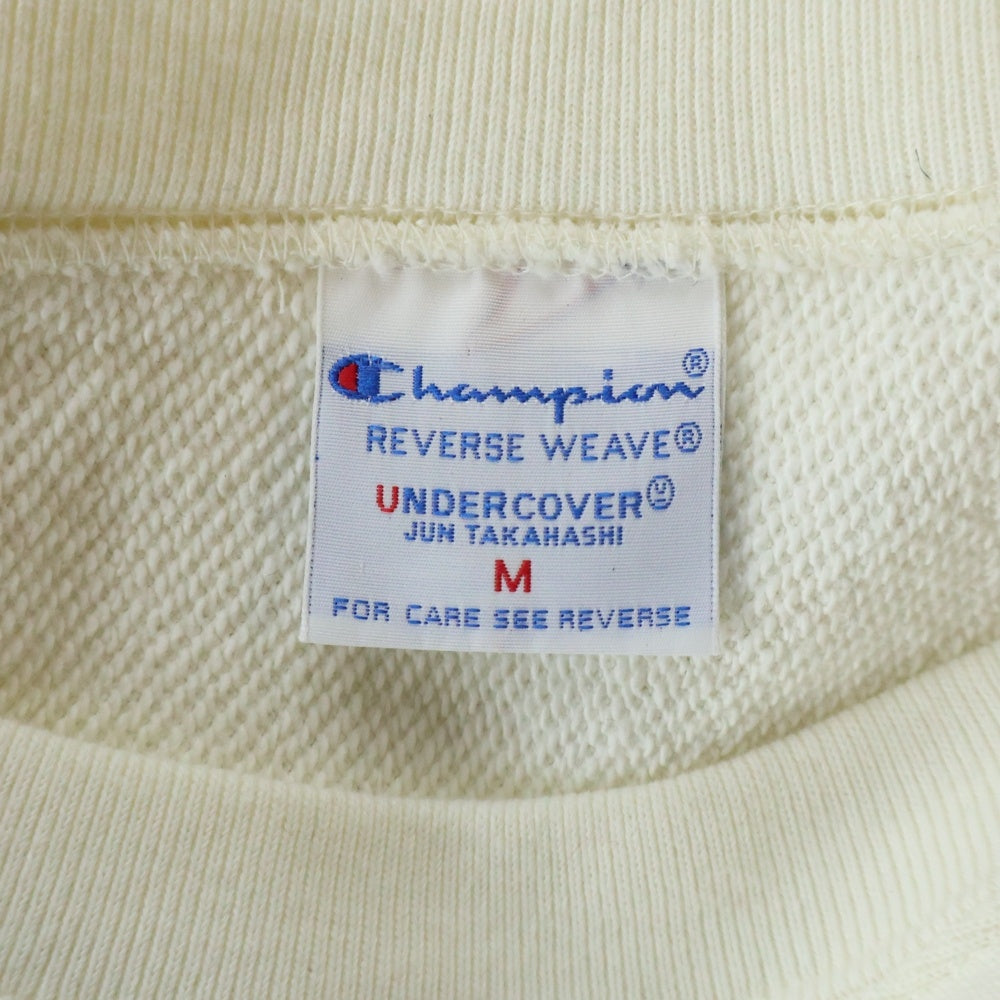 CHAMPION(チャンピオン) ×UNDERCOVER KOSMIK MUSIK SWEAT ×アンダーカバー プリントクルーネック長袖スウェットトレーナー アイボリー C8-B009