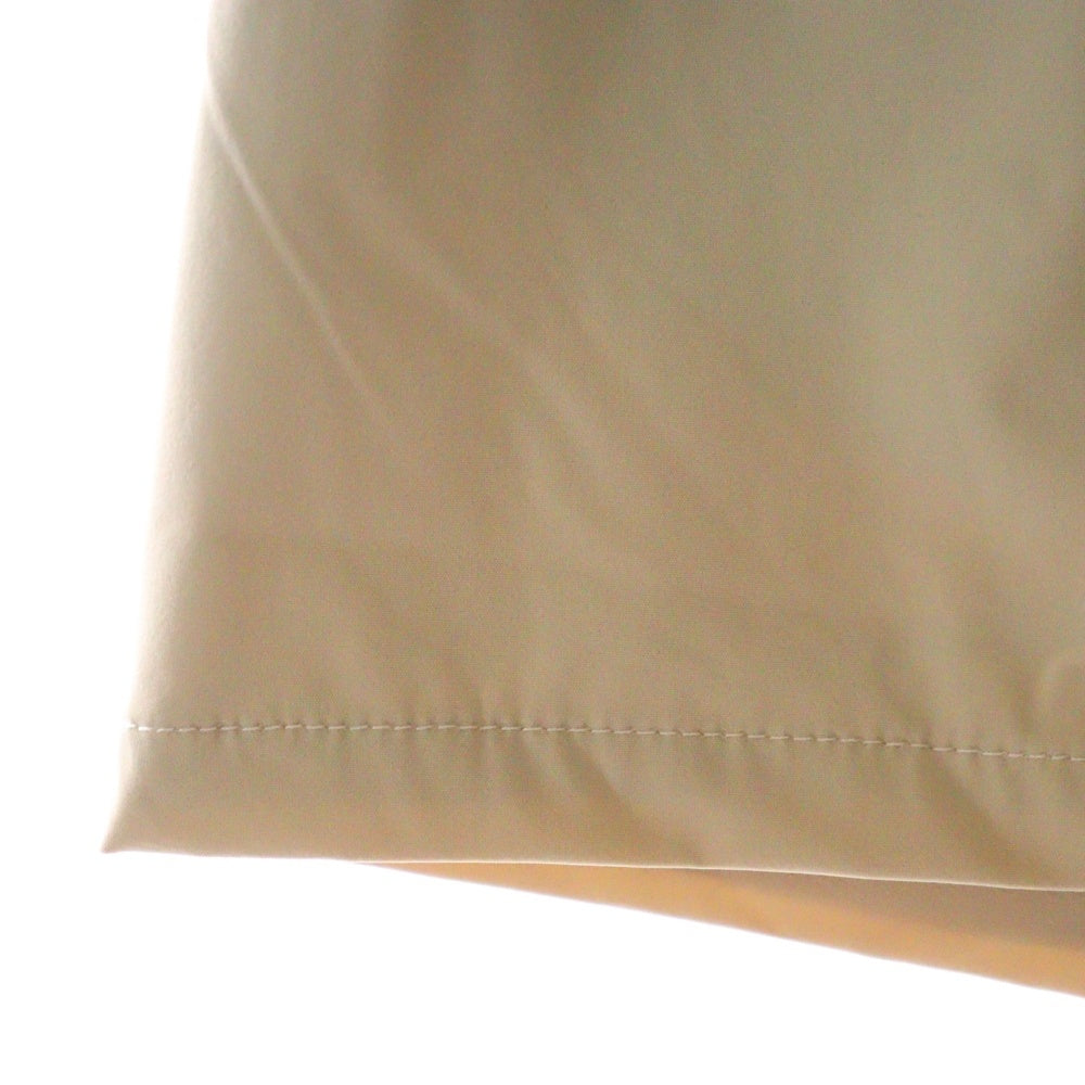 FEAR OF GOD ESSENTIALS(フィアオブゴッド エッセンシャルズ) NYLON SHORT PANTS ラバーロゴ ナイロンハーフパンツ ショーツ ベージュ