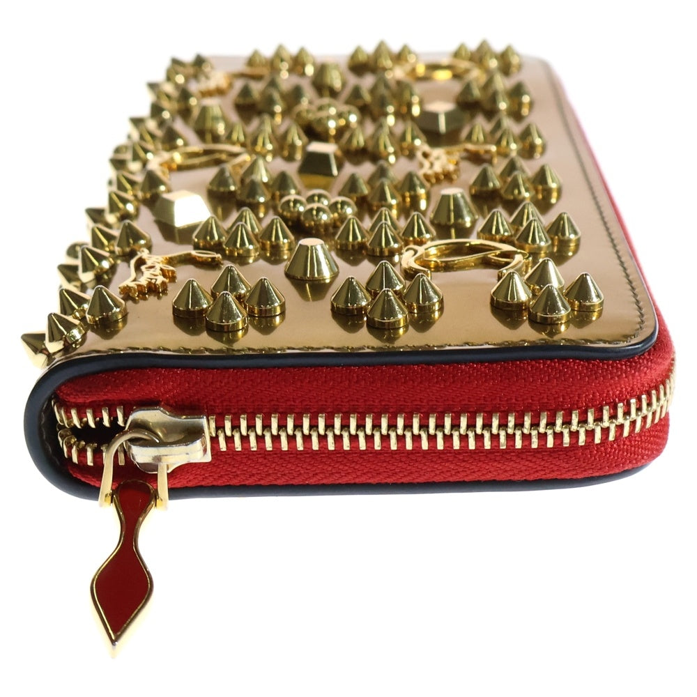 CHRISTIAN LOUBOUTIN(クリスチャンルブタン) パネトーネ スタッズ ラウンドファスナー パテントレザーウォレット 長財布 1185053 ゴールド/レッド