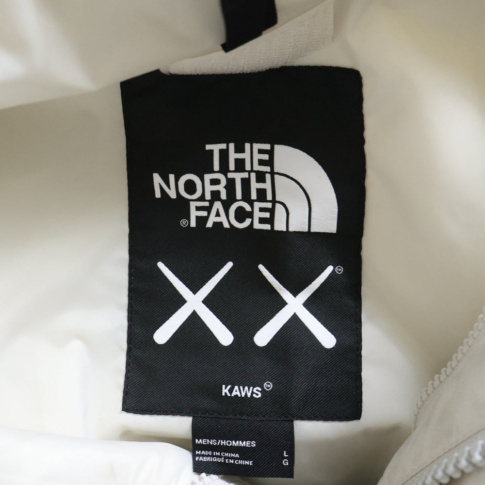 THE NORTH FACE(ザノースフェイス) 22SS ×KAWS RETRO 1986 MOUNTAIN PARKA JACKET カウズ マウンテンパーカー ナイロンジャケット ベージュ NF0A7WLW