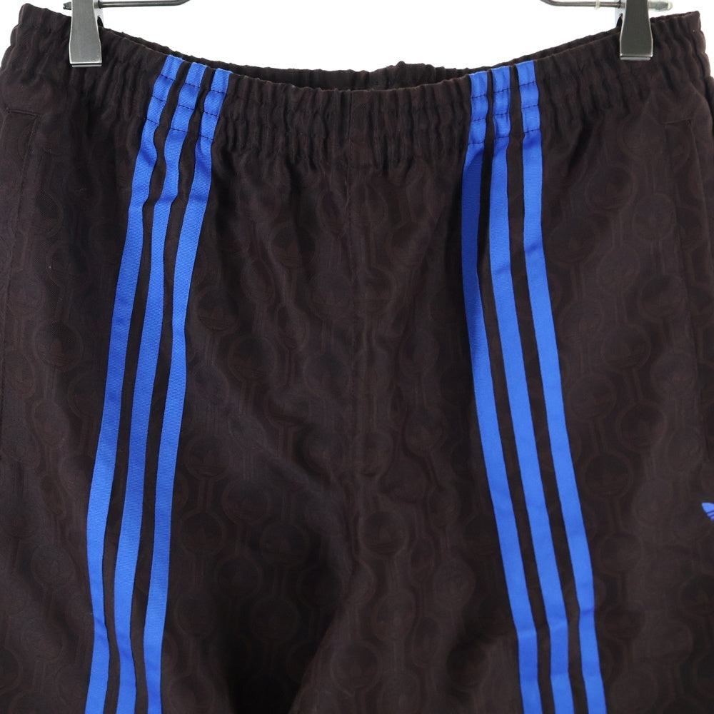 adidas(アディダス) LARGE CLUB TRACKPANTS 総柄トラックパンツ ブラウン JN5970