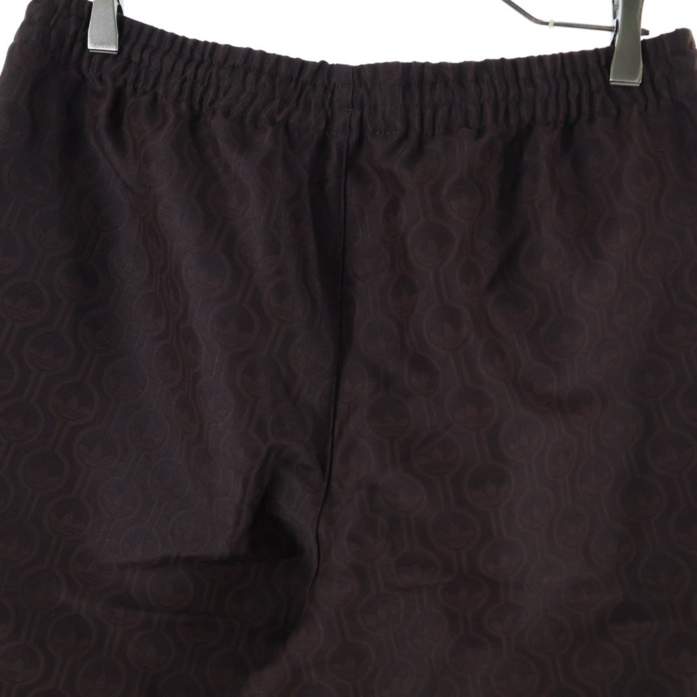 adidas(アディダス) LARGE CLUB TRACKPANTS 総柄トラックパンツ ブラウン JN5970