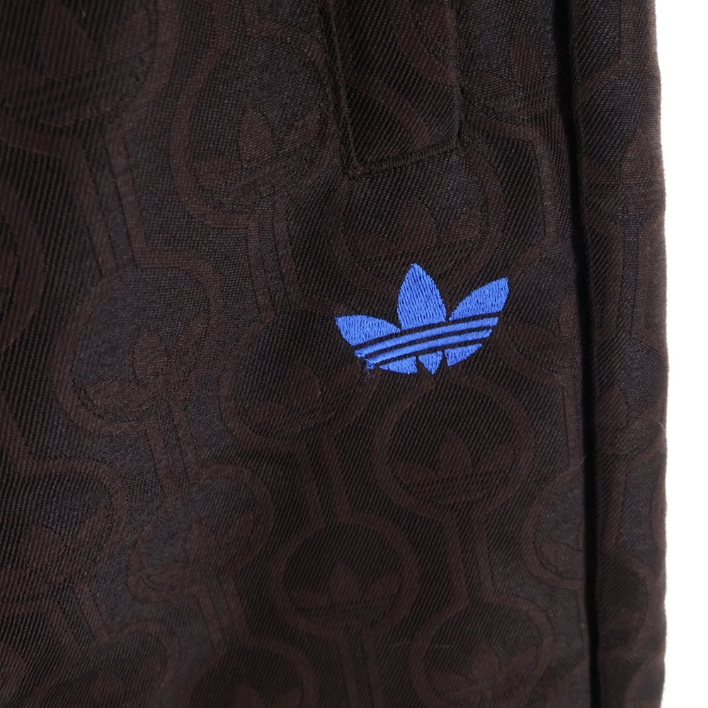 adidas(アディダス) LARGE CLUB TRACKPANTS 総柄トラックパンツ ブラウン JN5970