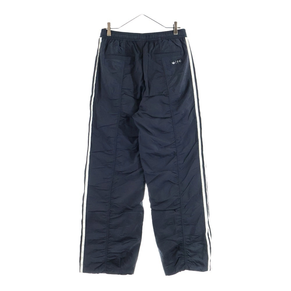 THUG CLUB(サグクラブ) ×adidas WOVEN TRACKPANTS アディダス ロゴプレート ナイロントラックパンツ グレー KC2200