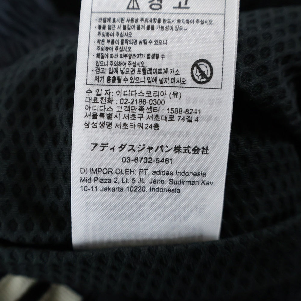 THUG CLUB(サグクラブ) ×adidas WOVEN TRACKPANTS アディダス ロゴプレート ナイロントラックパンツ グレー KC2200