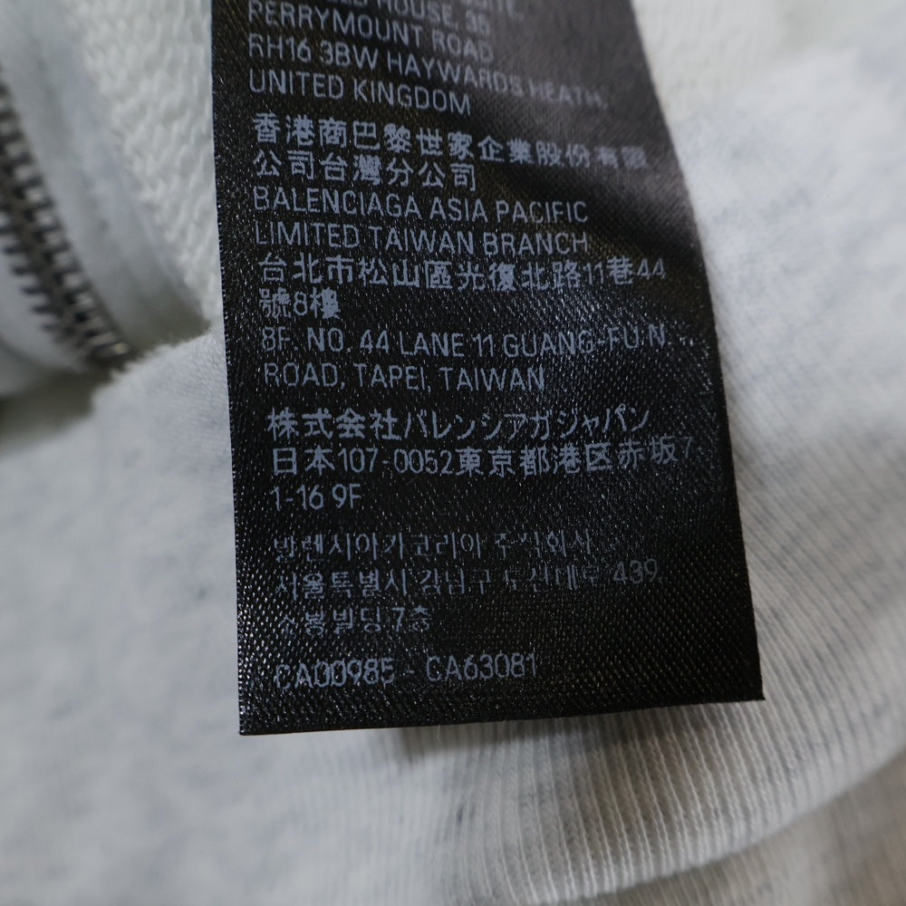 BALENCIAGA(バレンシアガ) 24SS Music Archive Series Connected Zip Up Hoodie アーカイブロゴ ダメージ加工 ジップアップスウェットパーカー フーディー グレー 744457 TQVA6