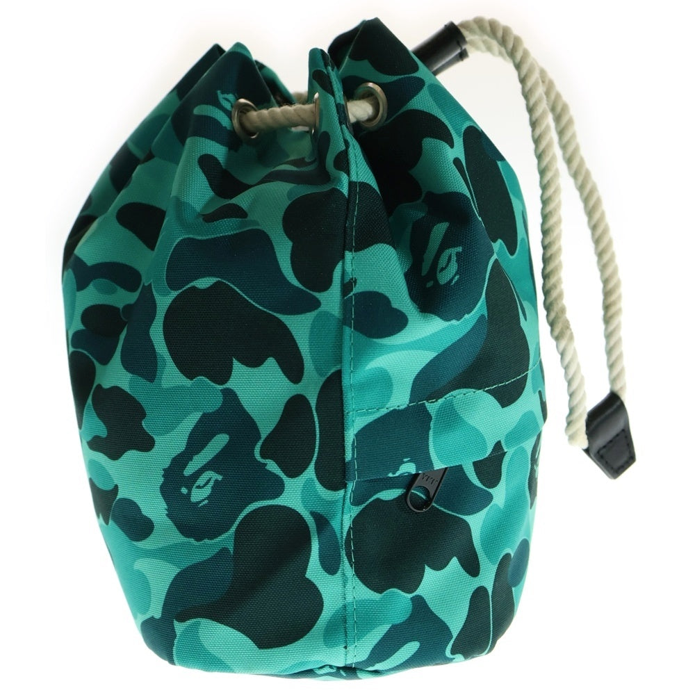 SAINT MICHAEL(セントマイケル) 24SS ×A BATHING APE AP ROPE SNAP BAG アベイシングエイプ カモフラージュ 迷彩巾着バッグ ブルー SM-YS8-0000-C36
