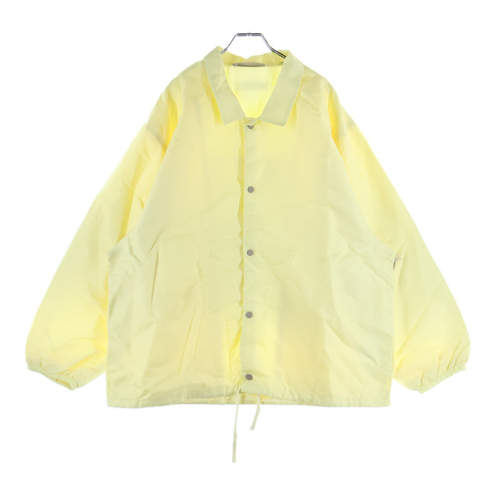 FEAR OF GOD ESSENTIALS(フィアオブゴッド エッセンシャルズ) NYLON COACH JACKET 1977 ナイロンコーチジャケット イエロー