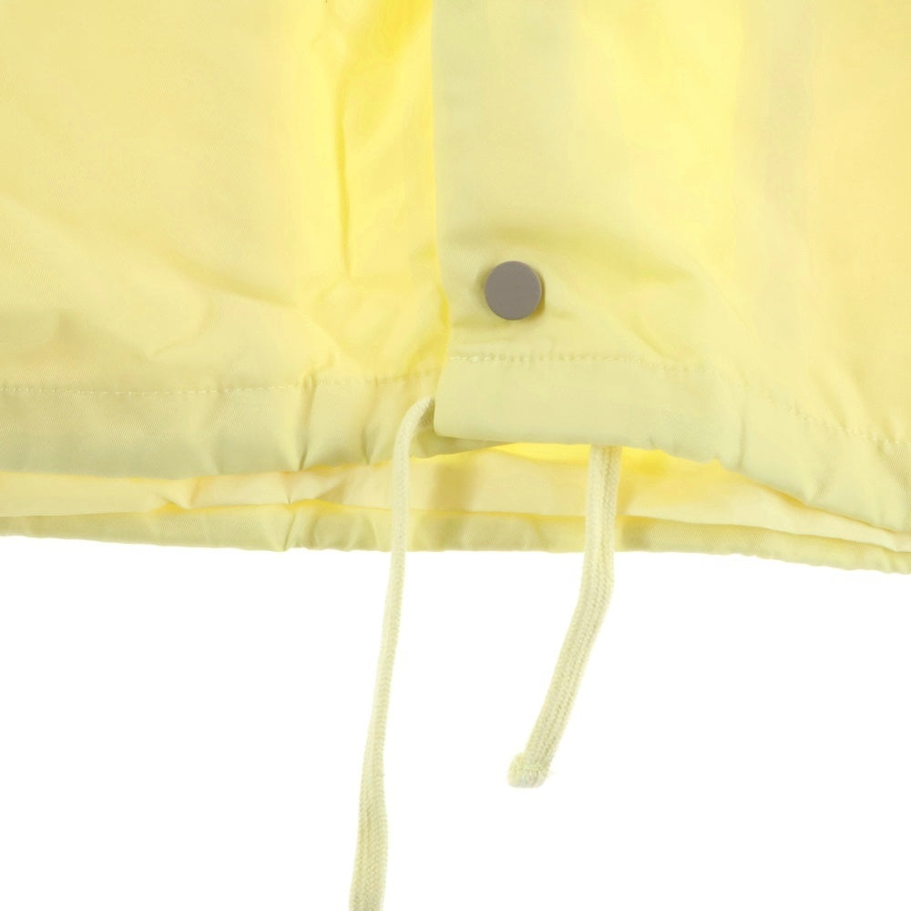 FEAR OF GOD ESSENTIALS(フィアオブゴッド エッセンシャルズ) NYLON COACH JACKET 1977 ナイロンコーチジャケット イエロー