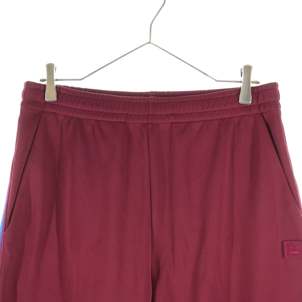 Acne Studios(アクネ ストゥディオズ) サイドライン ドローコード トラックパンツ レッド