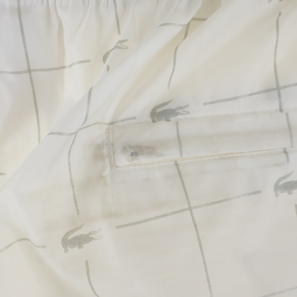 SUPREME(シュプリーム) 18SS ×LACOSTE Reflective Grid Nylon Track Pant リフレクティブ グリッド ナイロントラックパンツ ホワイト XH8504