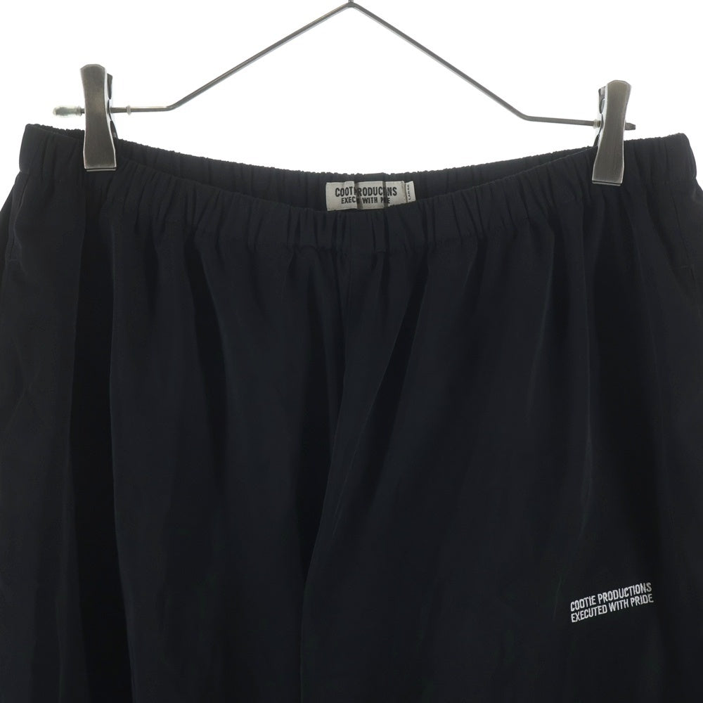 COOTIE PRODUCTIONS(クーティー プロダクションズ) 23AW Raza Track Pants ロゴ刺繍 ラサトラックパンツ ブラック CTE-23A105