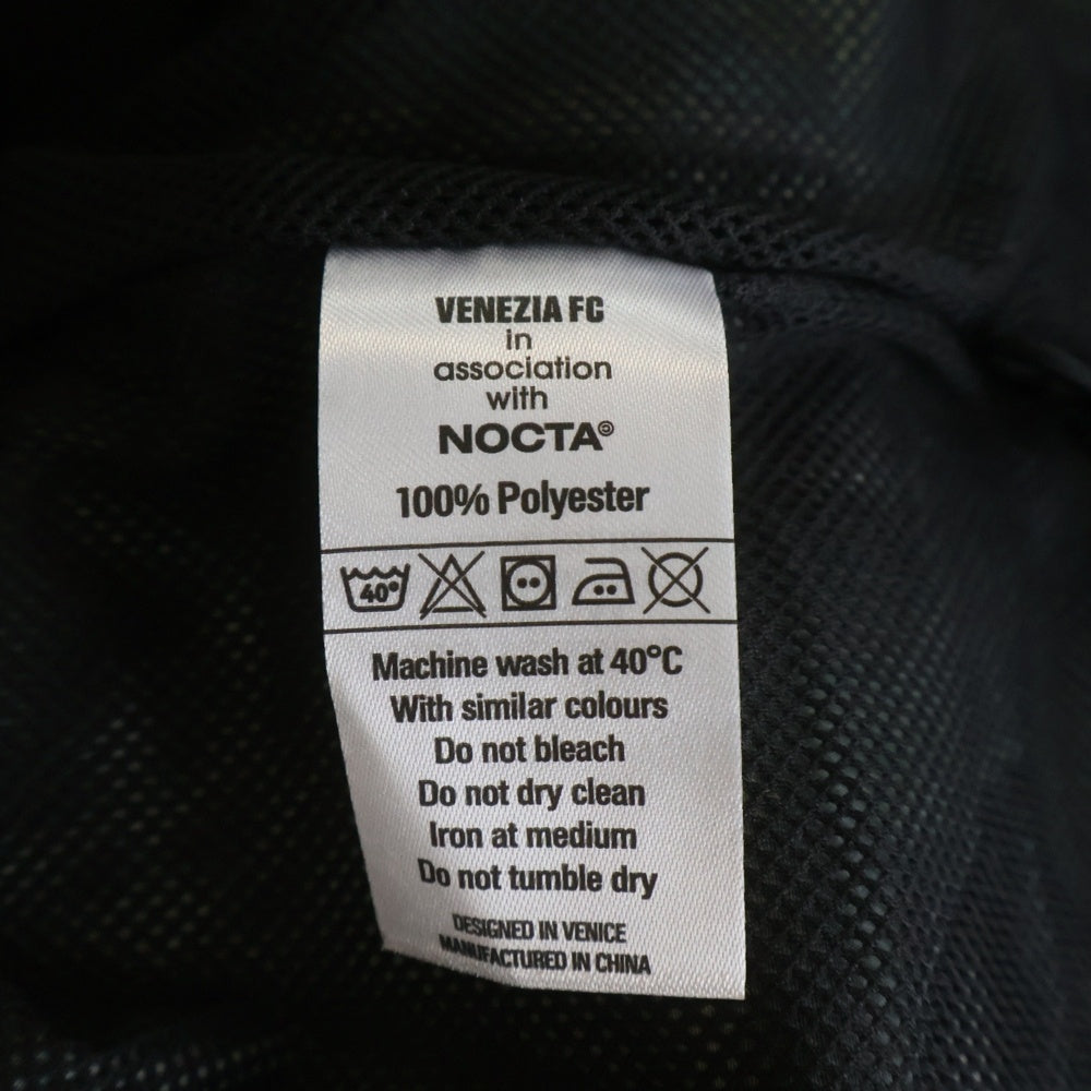 NO BRAND(ノーブランド) NOCTA × VENEZIA FC ノクタ × ヴィゼル Lion Camo Rain Jacket カモフラ ナイロン トラックジャケット カーキ