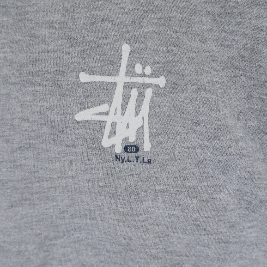 STUSSY(ステューシー) 90S VINTAGE NYLTA 80 ロゴデザイン クルーネック カットソー ラグランスリーブTシャツ グレー