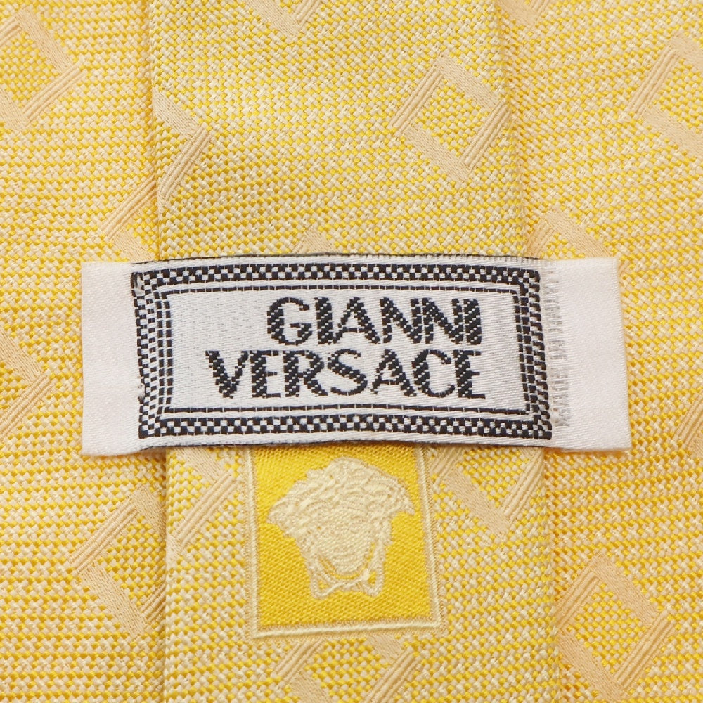 GIANNI VERSACE(ジャンニ ヴェルサーチ) 総柄 シルクネクタイ イエロー