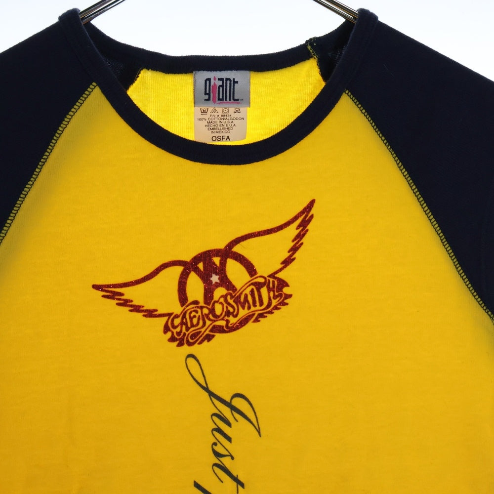 VINTAGE(ヴィンテージ) 00SS VINTAGE GIANT AERO SMITH WINGS エアロスミス ウィングス フロントロゴプリント 半袖Tシャツ カットソー イエロー/ネイビー レディース