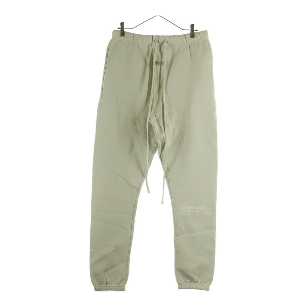 FEAR OF GOD ESSENTIALS(フィアオブゴッド エッセンシャルズ) ラバーロゴ ドローコード フリース スウェットパンツ アイボリー