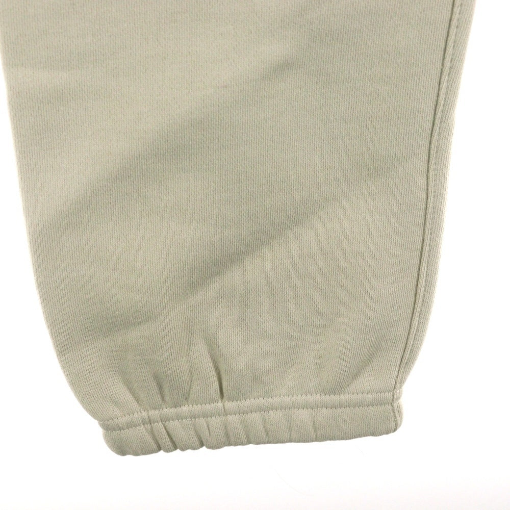 FEAR OF GOD ESSENTIALS(フィアオブゴッド エッセンシャルズ) ラバーロゴ ドローコード フリース スウェットパンツ アイボリー
