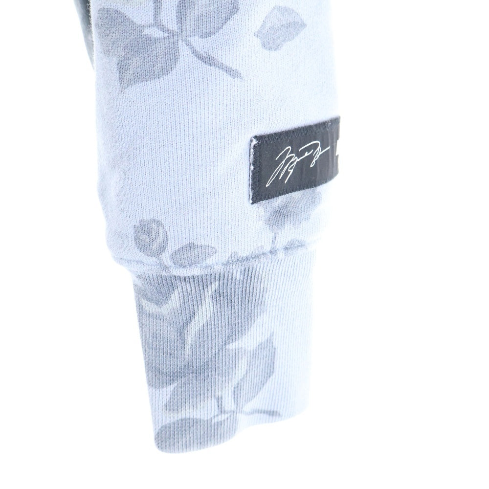 JORDAN BRAND(ジョーダンブランド) ×A Ma Maniere ア マ マニエール 総柄 フロントロゴ刺繍 プルオーバーパーカー ライトブルー DJ9753-464