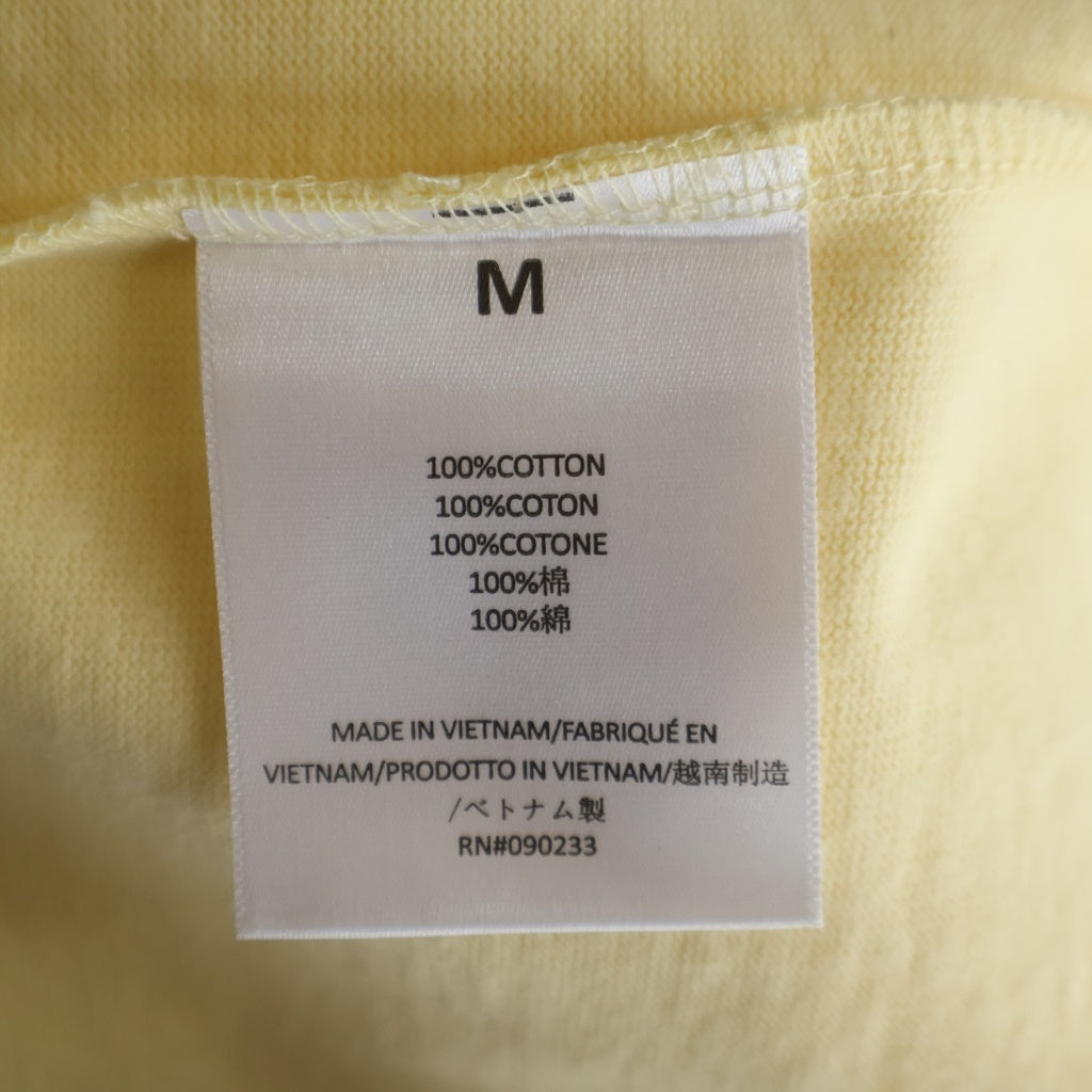 FEAR OF GOD ESSENTIALS(フィアオブゴッド エッセンシャルズ) Football Tee フットボールティー ラバーロゴVネックラグラン7分袖Tシャツ イエロー
