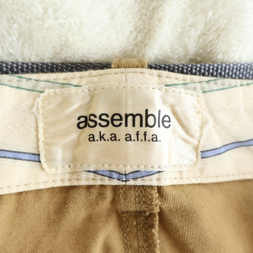 assemble a.k.a a.f.f.a(アッセンブルエーケーエーエーエフエフエー) 21SS Bondage Belt Pants ボンテージベルトパンツ ベルト付コットンテーパードパンツ ベージュ AF1A4501