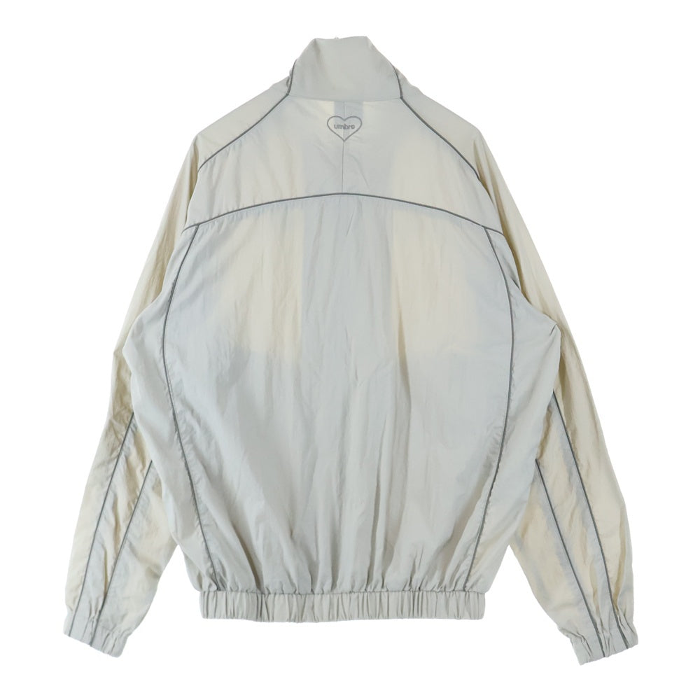 UMBRO(アンブロ) ×HTH フルジップ ナイロン ブルゾン クリーム
