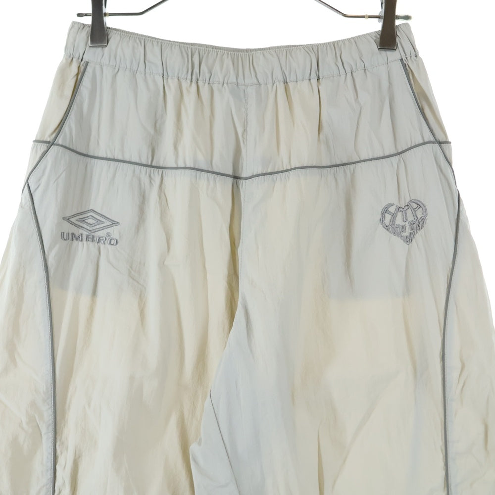 UMBRO(アンブロ) ×HTH フルジップ ナイロン パンツ クリーム