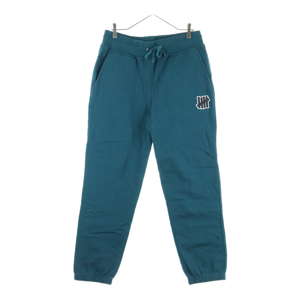 UNDEFEATED(アンディフィーテッド) ロゴ パッチ スウェット パンツ グリーン
