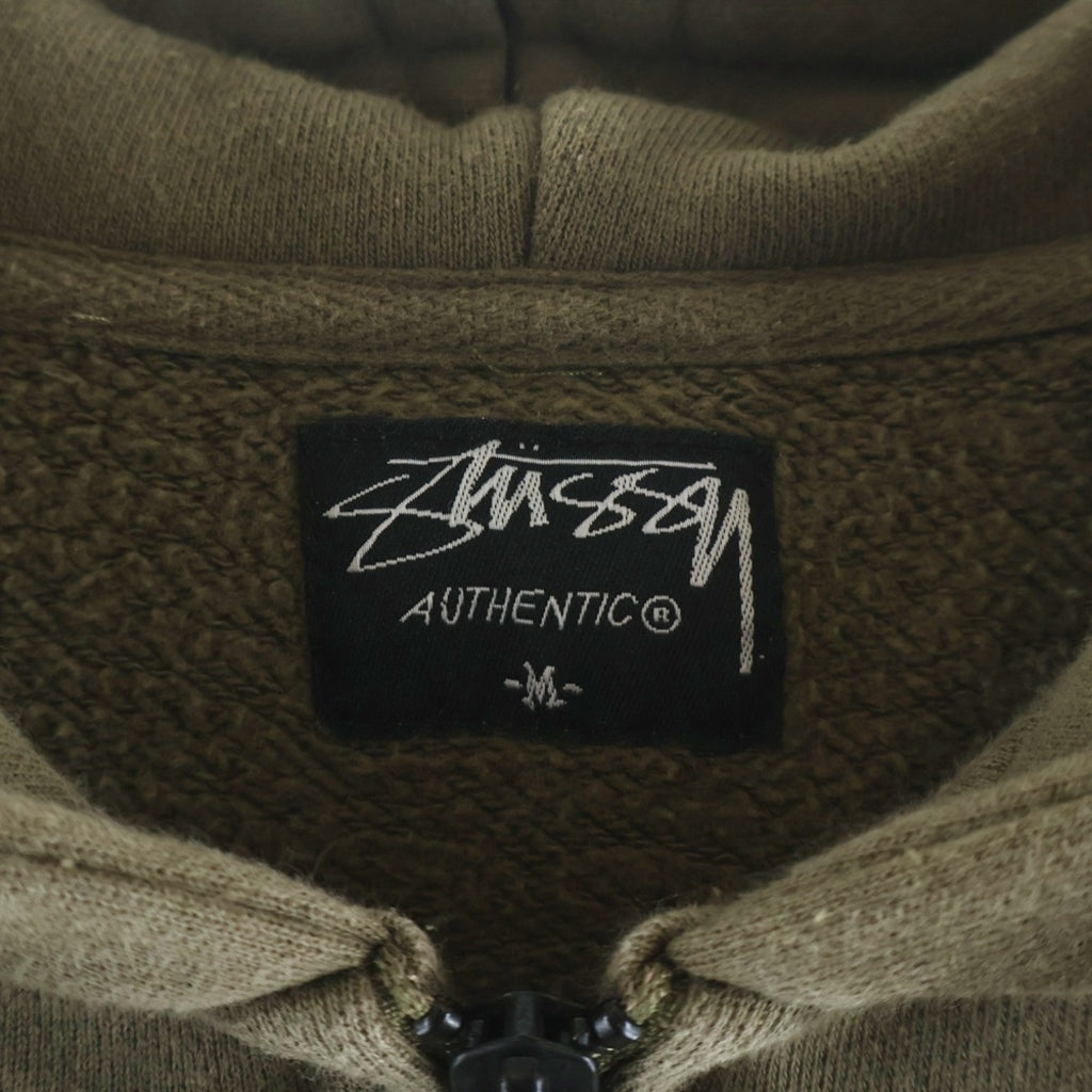 STUSSY(ステューシー) World Tour ストックロゴ 両面プリント 切替 ジップアップパーカー フーディー カーキ