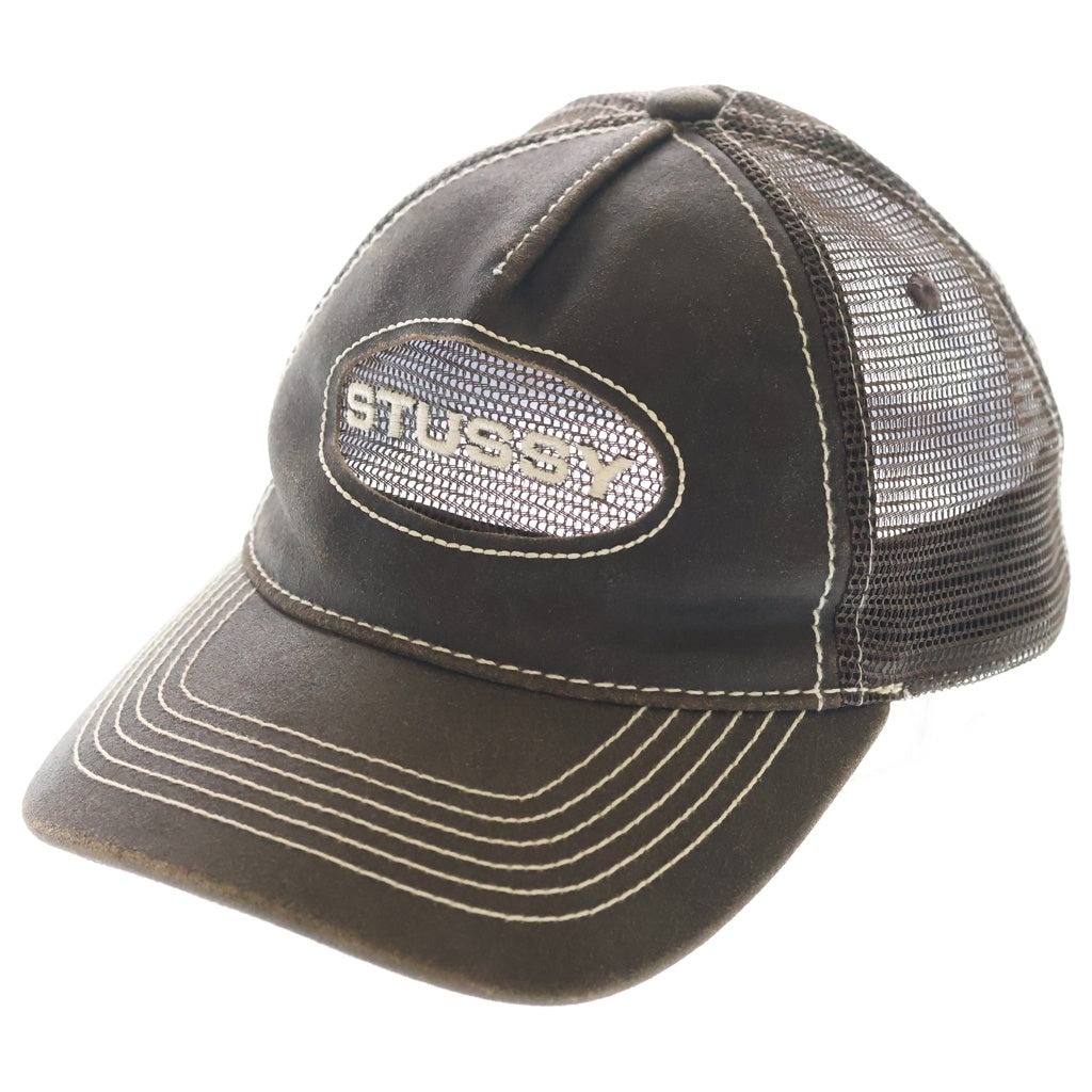 STUSSY(ステューシー) Cut Out Leather Trucker Cap ロゴ刺繍 カットアウト レザー メッシュ トラッカーキャップ ブラウン