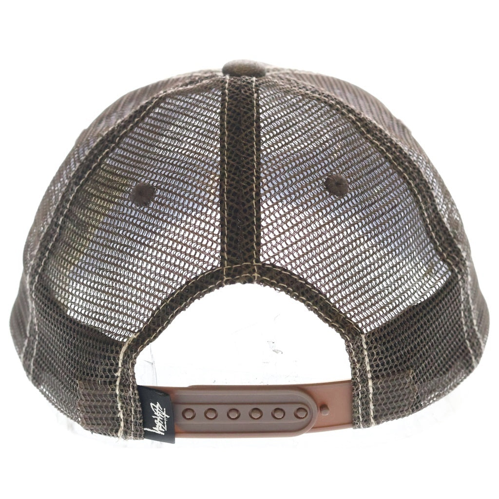 STUSSY(ステューシー) Cut Out Leather Trucker Cap ロゴ刺繍 カットアウト レザー メッシュ トラッカーキャップ ブラウン