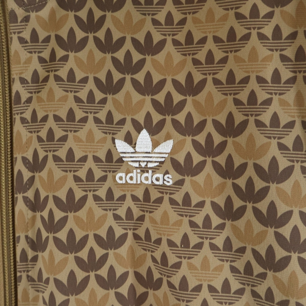 adidas(アディダス) ファイヤーバード フットボール クラシック モノトラックトップ トラックジャケット ベージュ IS2925